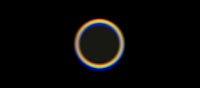 a rainbow ring on a black background